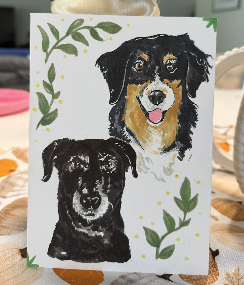 Custom pet portrait of two dogs, hand-illustrated on a card with green sprigs
